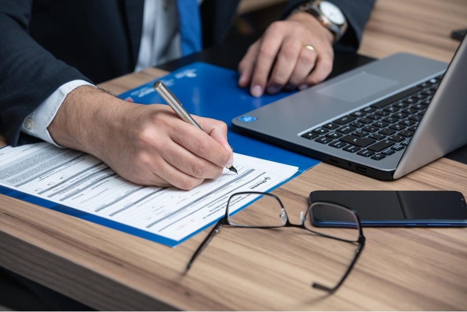 A PII lawyer preparing paperwork for a client